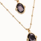 Multi strand necklace with two black oval faceted crystals